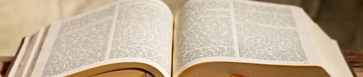 still life with bible on the desk